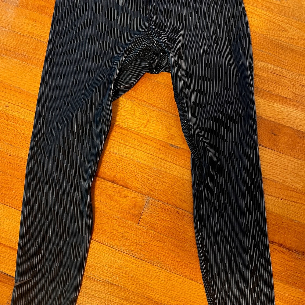 Nike black iridescent textured running leggings
